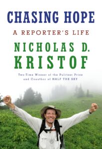 Book cover: Nicholas Kristof smiles in a foggy forest clearing with his arms raised in the air. Title at the top says "Chasing Hope: A Reporter's Life"