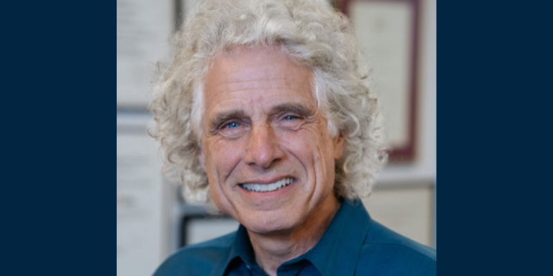 Stephen Pinker - an individual with curly hair and a blue shirt