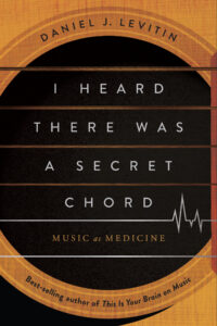 Book cover of 'I Heard There Was a Secret Chord: Music as Medicine' by Daniel J. Levitin, featuring the image of a guitar's sound hole and strings, with an EKG line and the text 'Best-selling author of This Is Your Brain on Music.'