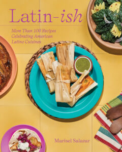 Book cover for "Latin-ish." It includes the subtitle "More Than 100 Recipes Celebrating American Latino Cuisines." The cover showcases three plates of food on a bright yellow background: one with tamales/green sauce, a vegetable dish, and a creamy topped dish.