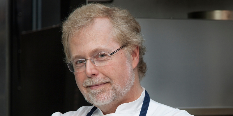 Headshot of Nathan Myhrvold (with fair skin, blonde hair/beard, and eyeglasses)