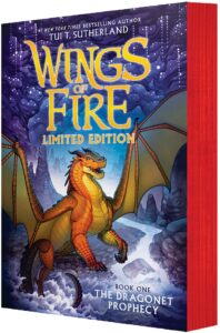 Limited edition book cover of 'Wings of Fire: The Dragonet Prophecy' by Tui T. Sutherland, featuring a fierce orange dragon with outstretched wings against a rocky, mystical landscape.