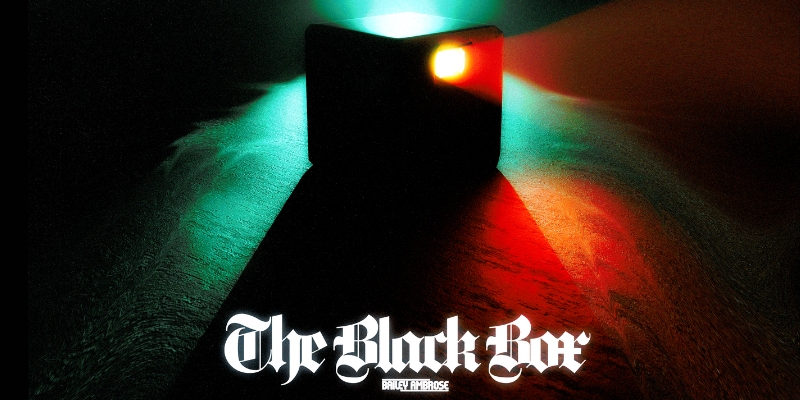 Dark promotional graphic for “The Black Box” by Bailey Ambrose Heller, showing a black cube backlit by green light and projecting red light outwards through a hole in the box. The event title is in bold Gothic font.