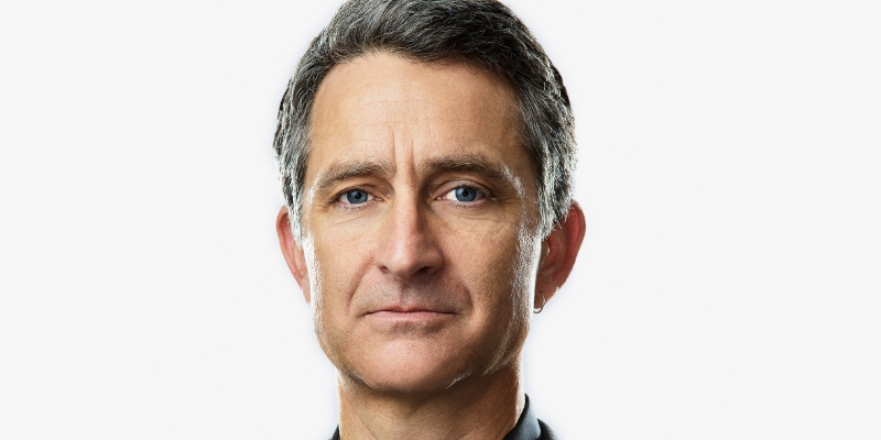Headshot of Vince Beiser (with fair skin and short grey hair)