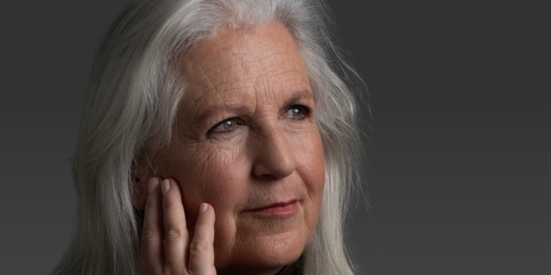 Headshot of Terry Tempest Williams (with fair skin and long grey hair)