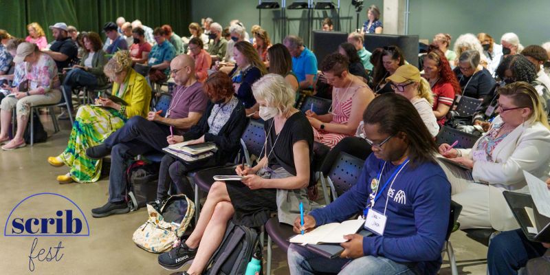 A small audience is seated in rows while writing in notebooks. The Scrib Fest logo is in the bottom left corner.