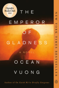 Book cover for "The Emperor of Gladness" by Ocean Vuong, featuring a silhouette against an orange background.