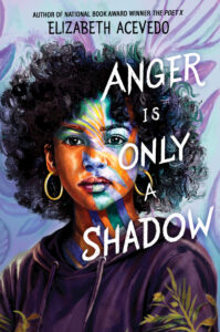 Book cover of "Anger Is Only a Shadow" by Elizabeth Acevedo, featuring an artistic portrait of a young person with curly hair and colorful paint on their face, wearing hoop earrings and a black hoodie. The title is in white overlaid on their image.
