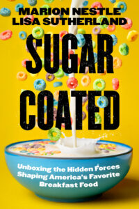 Book cover of "Sugar Coated" by Marion Nestle and Lisa Sutherland, featuring a blue bowl filled with colorful cereal splashed with milk against a bright yellow background.