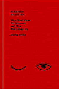 Book cover of "Sleeping Beauties: Why Good Ideas Go Dormant and How They Wake Up" by David Byrne, featuring a red background and an illustration of two eyes with one winking.